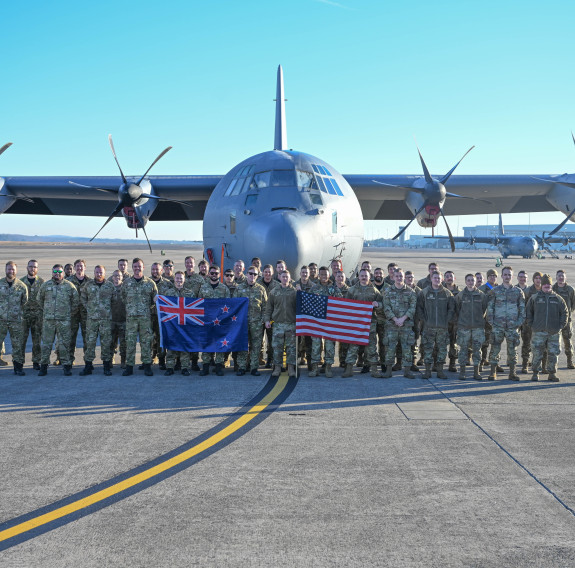 Members of RNZAF pose for a photo with members of the 19th Aircraft Maintenance Squadron at Little Rock Air Force Base, Arkansas, Nov. 29, 2023. (U.S. Air Force photo by Airman 1st Class Julian Atkins)