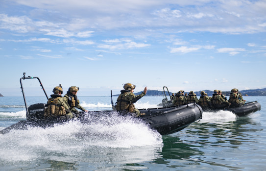 New Zealand Army soldiers operate two inflatable Zodiac boats in Wellington Harbour.