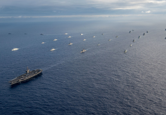 A multinational fleet performs a controlled breakaway during a photo exercise off the coast of Hawaii during the Rim of Pacific Exercise (RIMPAC), July 26 2018 