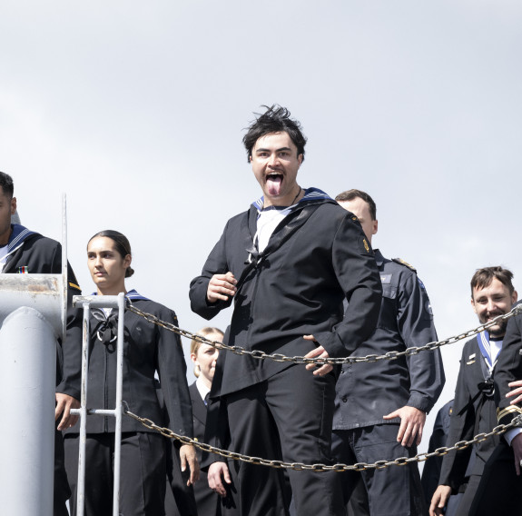 Sailors on HMNZS Aotearoa perform a haka upon their return.