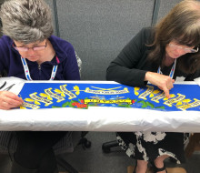 Susan Jones, left, and Wendy Hatton working on the 2/1 RNZIR Colours in Yorkshire before they were collected and brought back to New Zealand for last week’s ceremony