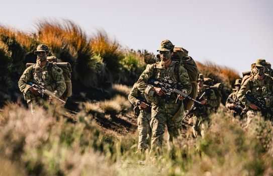 Private Marlee Pene and her section pack march to the pickup point on the final day of the field phase.