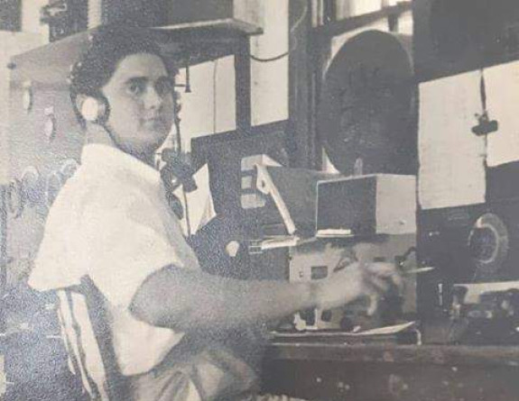 Tai Nicholas, a ‘Polynesian cadet’ at work at the government radio station in Rarotonga. Nicholas was one of the locally recruited, civilian radio operators who had a central role in the Cook Islands coastwatching network. Credit: An Archives New Zealand 