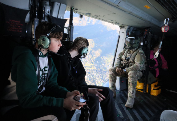 Patients look out at the Christchurch view mid-flight